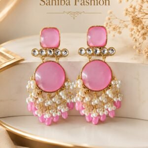 Elegant pink stone and pearl dangler earrings with gold-tone detailing, showcased in a luxury jewelry mockup by Sahiba Fashion.