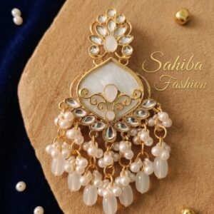 Milky white enamel earring with Kundan stones and white pearl drops.