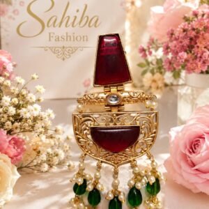 Maroon stone golden earrings with green beads, pearl detailing and intricate traditional design