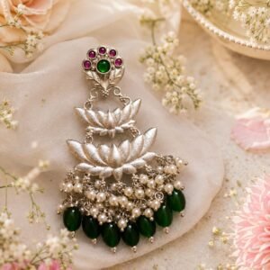 Silver-tone lotus statement earrings with green stones, pink accents, pearl detailing and green bead drops