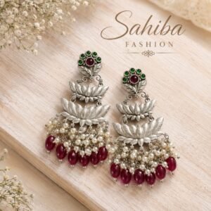 Silver-tone lotus statement earrings with red stones, pink accents, pearl detailing and red bead drops