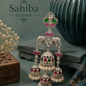 Silver-tone traditional jhumka earrings with elephant motifs, pink and green stones, and pearl detailing
